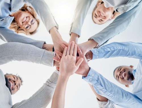 Hands together, support and teamwork people for collaboration success, staff mission and business solidarity. Happy group of employees stacked sign for goals, community and diversity in below mockup.